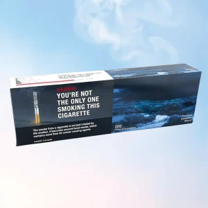 Carton of Canadian Classics Silver on a blue background with a bit of smokes